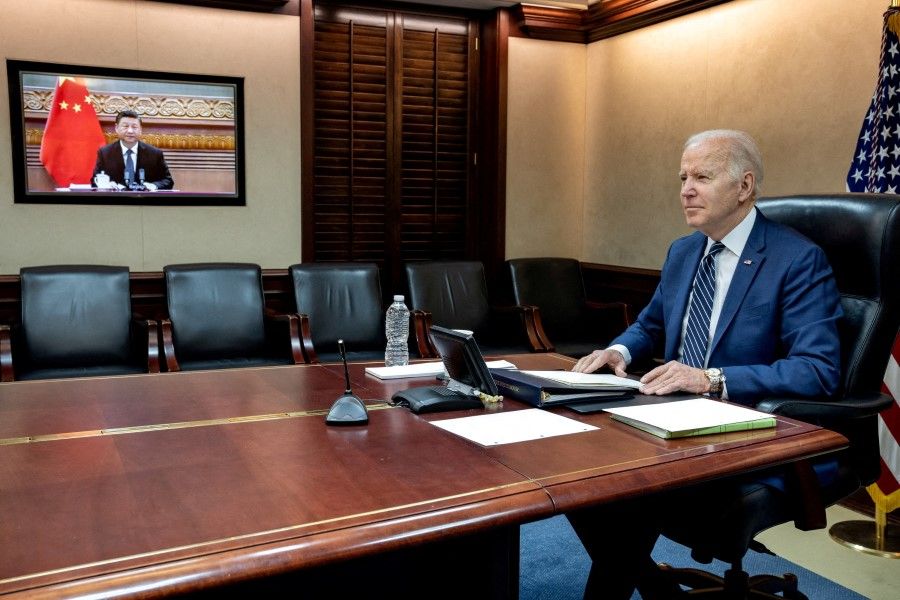 US President Joe Biden holds virtual talks with Chinese President Xi Jinping from the Situation Room at the White House in Washington, US, 18 March 2022. (The White House/Handout via Reuters)