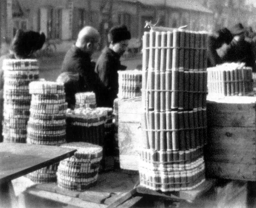 A stall selling firecrackers at a temple fair in Beijing. Firecrackers were lit during the first five days of the new year, with the loudest noise at midnight on the first day.