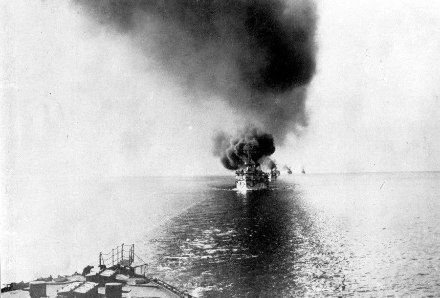 Plumes of smoke from a Japanese ship hit by a Russian ship, May 1905. When both fleets were four nautical miles apart, Admiral Tōgō ordered the Japanese fleet to change formation and execute a U-turn to first draw Russian fire. Three Japanese ships were sunk and one incapacitated. But once the manoeuvre was complete and the Japanese ships were parallel to the Russians, the Japanese ships sped up and unleashed wave after wave of full firepower, quickly doing heavy damage to the Russian battleship Knyaz Suvorov. Second Pacific Squadron commander Zinovy Petrovich Rozhestvensky was injured and communications equipment was broken, leaving the mighty Russian fleet without a commander.