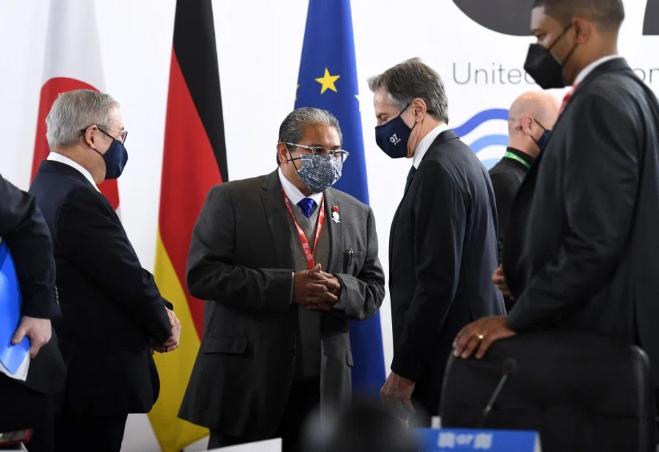 US Secretary of State Antony Blinken (centre right) speaks with Dato Erywan Pehin Yusof, Minister of Foreign Affairs of Brunei (centre) in Liverpool, northwest England on 12 December 2021, at the ASEAN-G7 Foreign Ministers' Meeting. (Olivier Douliery/AFP)