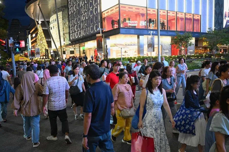 People crossing the road at Orchard Road, Singapore, 15 December 2024. (SPH Media)