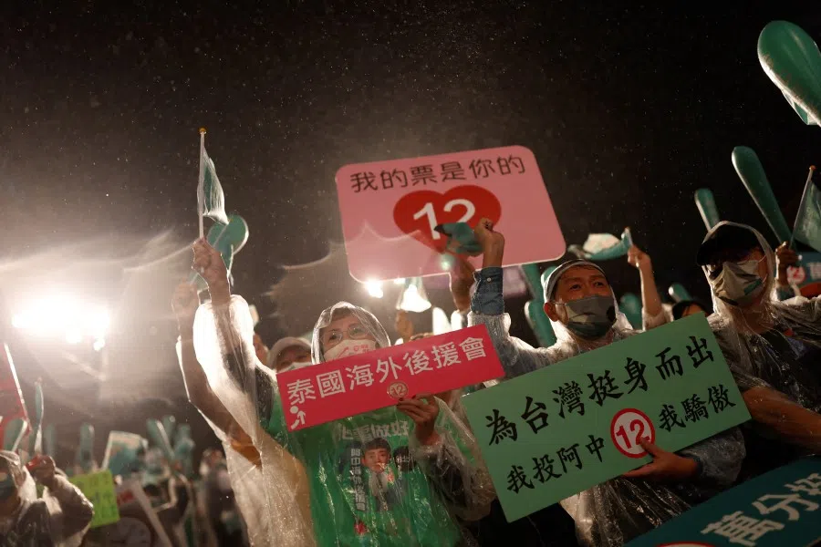 Supporters of the Democratic Progressive Party (DPP) attend a campaign rally ahead of the local elections, in Taipei, Taiwan, 25 November 2022. (Carlos Garcia Rawlins/Reuters)
