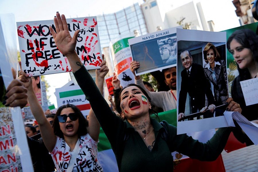 Demonstrators shout slogans during a protest in support of Iranian women and against the death of Mahsa Amini, near the Iranian consulate in Istanbul, Turkey, 22 October 2022. (Dilara Senkaya/File Photo/Reuters)