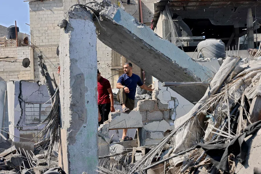 People search for survivors after an Israeli air strike in Rafah in the southern Gaza Strip on 11 October 2023. (Said Khatib/AFP)