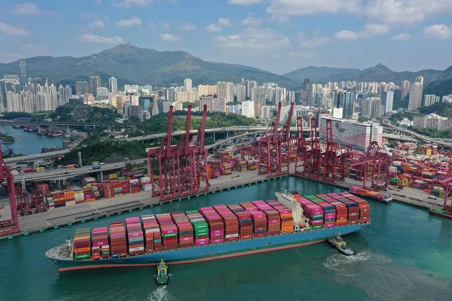 An aerial photo shows a container ship docking at the Kwai Chung container terminal in Hong Kong on 22 October 2024. (Peter Parks/AFP)