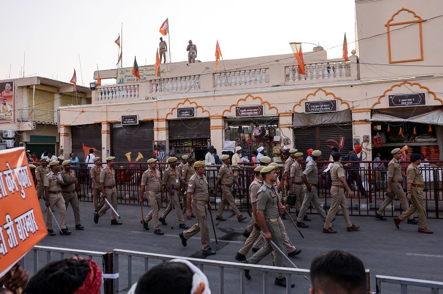 Police patrol a road on the day of India’s Prime Minister Narendra Modi’s election campaign rally, in Ayodhya, India, on 5 May 2024.  (Francis Mascarenhas/Reuters)