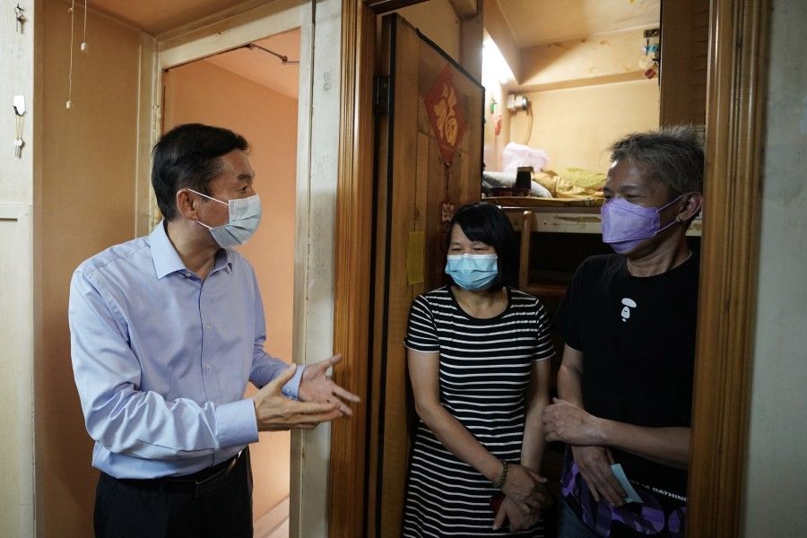 Hong Kong Liaison Office (LOCPG) director Luo Huining visiting "cage home" residents in Hong Kong. (LOCPG/CNS)