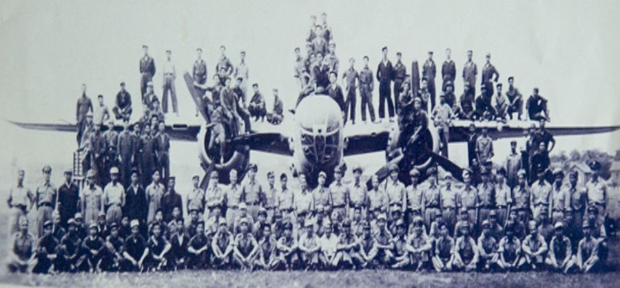 The entire 1st Bomb Squadron celebrating the Japanese surrender, Hanchung, 1945.