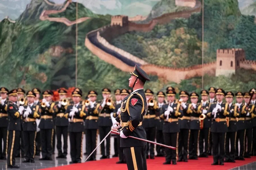 Official welcoming ceremony for the French President Emmanuel Macron and his wife, Brigitte Macron at the Great Hall of the People, Beijing, China, on 4 December 2025.