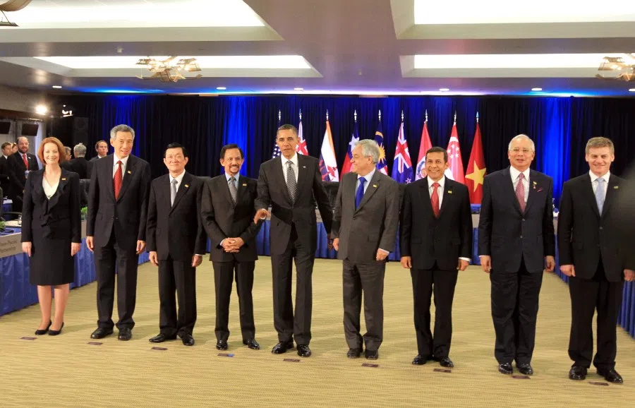 (From left) Australia Prime Minister Julia Gillard, Singapore Prime Minister Lee Hsien Loong, Vietnam President Truong Tan Sang, Brunei Sultan Hassanal Bolkiah, US President Barack Obama, Chile President Sebastian Pinera, Peru President Ollanta Humala, Malaysia Prime Minister Najib Razak and New Zealand Deputy Prime Minister Bill English pose for photo after attending the Trans-Pacific Partnership (TPP) Ministers & Leaders meeting at Hale Koa Hotel in Hawaii, on 14 November 2011. (SPH Media)