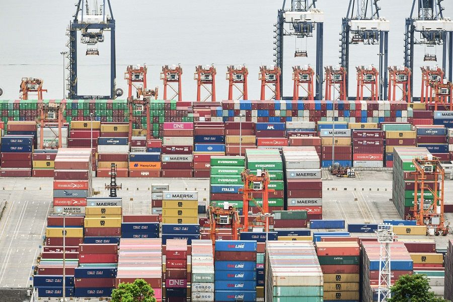 This aerial photo taken on 22 June 2021 shows cargo containers stacked at Yantian port in Shenzhen, Guangdong province, China. (STR/AFP)