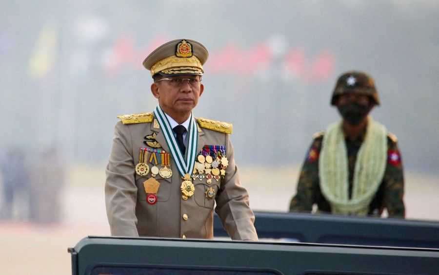 Myanmar's junta chief Senior General Min Aung Hlaing, who ousted the elected government in a coup on 1 February 2021, presides an army parade on Armed Forces Day in Naypyitaw, Myanmar, 27 March 2021. (Stringer/Reuters)
