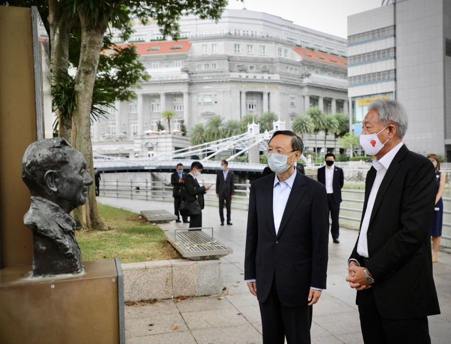 20 August 2020: Yang (left) visited the Deng Xiaoping Marker at ACM Green, which commemorates Deng's landmark visit to Singapore in 1978 and his contributions to the friendship between Singapore and China. (SPH)