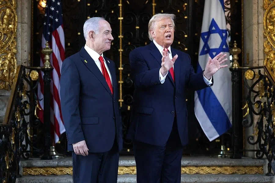 US President Donald Trump talks to the media as he welcomes Israeli Prime Minister Benjamin Netanyahu to his Mar-a-Lago club on 29 December 2025 in Palm Beach, Florida. (Joe Raedle/Getty Images/AFP)