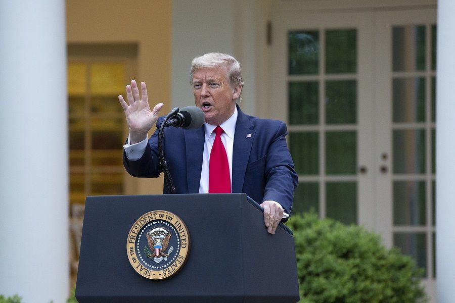 US President Donald Trump speaks during a news conference in the Rose Garden of the White House in Washington D.C., on 14 April 2020. (Stefani Reynolds/CNP/Bloomberg)