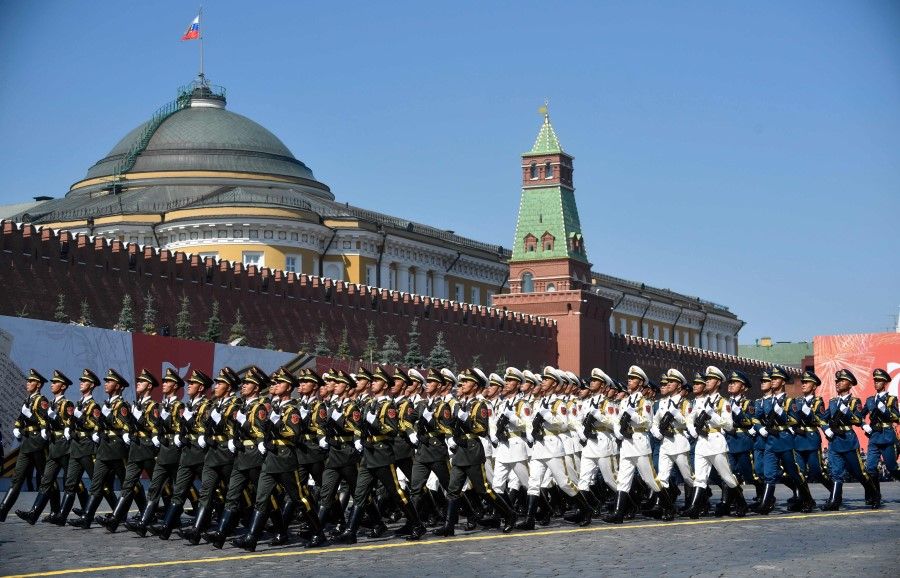 Soldiers from China's People's Liberation Army march on Red Square during a military parade, which marks the 75th anniversary of the Soviet victory over Nazi Germany in World War Two, in Moscow on 24 June 2020. (Alexander Nemenov/AFP)