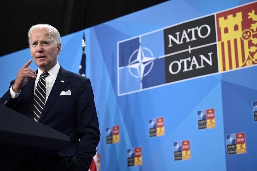 President Joe Biden gestures as he addresses media representatives during a press conference at the NATO summit at the Ifema congress centre in Madrid, on 30 June 2022. (Brendan Smialowski/AFP)