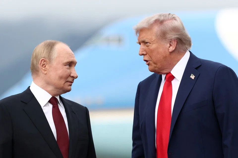 US President Donald Trump speaks with Russian President Vladimir Putin, as they meet to negotiate for an end to the war in Ukraine, at Joint Base Elmendorf-Richardson in Anchorage, Alaska, US, on 15 August 2025. (Kevin Lamarque/Reuters)