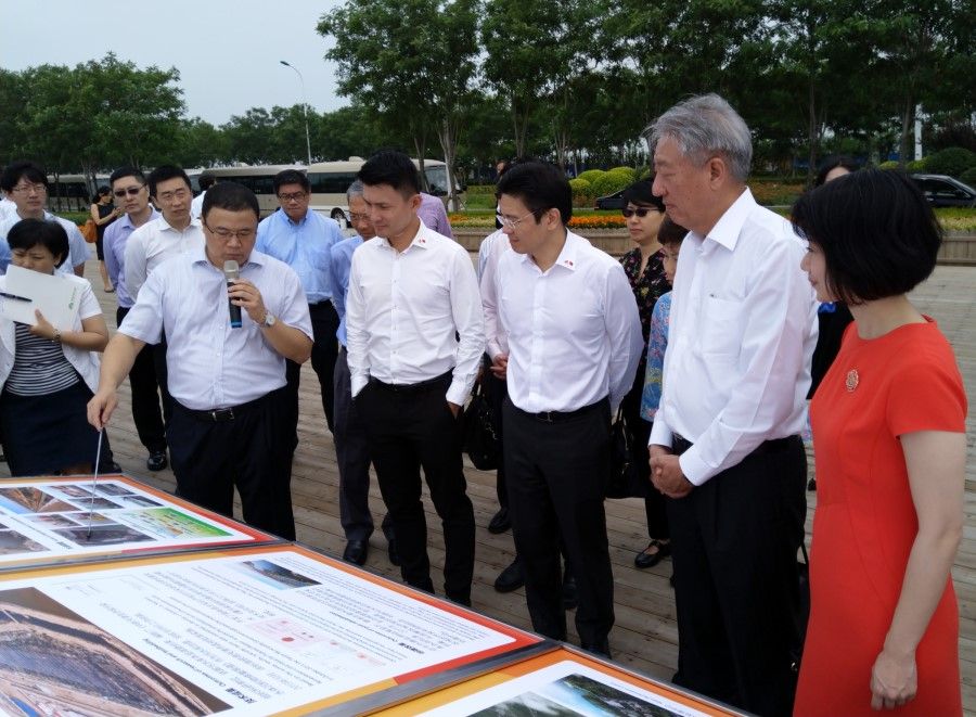 From right: Senior Parliamentary Secretary Sun Xueling, Deputy Prime Minister Teo Chee Hean, National Development Minister Lawrence Wong and Senior Parliamentary Secretary Baey Yam Keng touring the Sino-Singapore Tianjin Eco-City on 1 July 2018. (SPH Media)