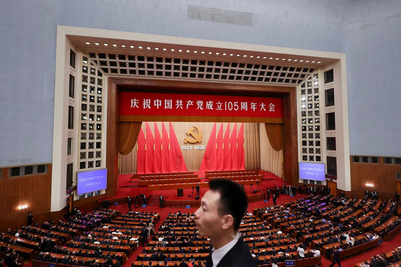 A security officer stands guard on the day of the ceremony marking the 105th anniversary of the founding of the Communist Party of China at the Great Hall of the People in Beijing, China, 1 July 2026.