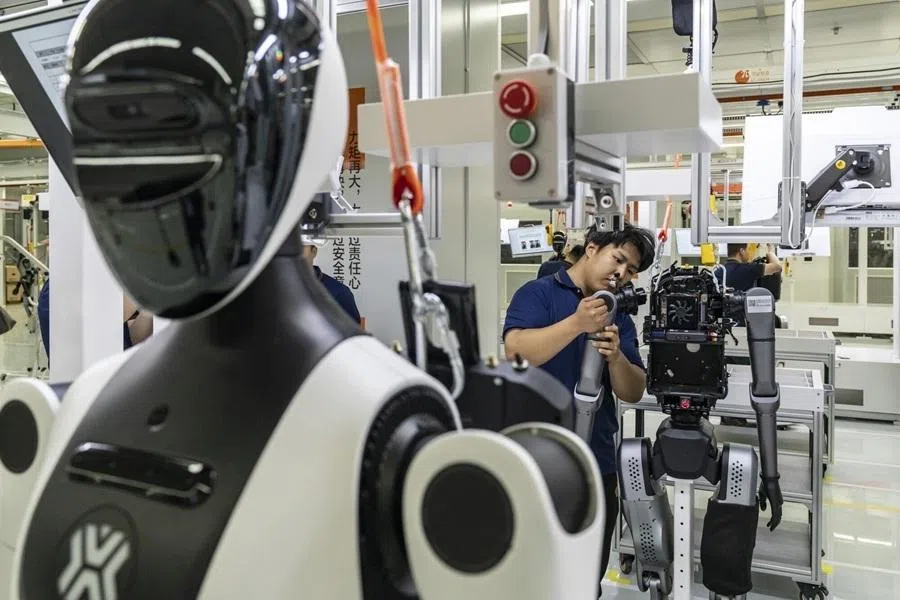 Technicians assemble humanoid robots at the Lingyi iTech Guangdong Co. Embodied Intelligence Super Factory facility in Beijing, China, on 29 May 2026.