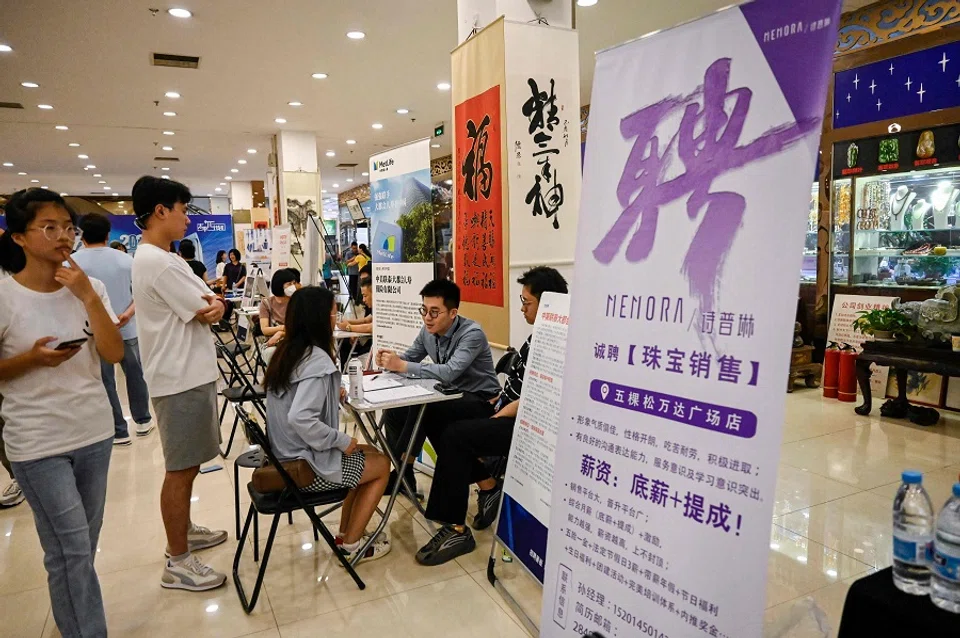 People attend a job fair in Beijing, China, on 19 August 2023. (Jade Gao/AFP)