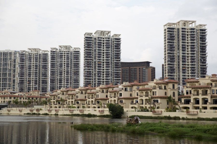 Low-rise and high-rise residential buildings stand at the Sea Shore of China development in the Sanya Bay district of Sanya, Hainan Province, 2014. (Brent Lewin/Bloomberg)