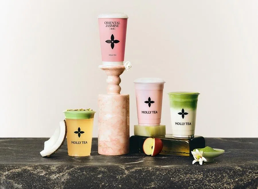 Drinks from Molly Tea showing the brand’s logo..