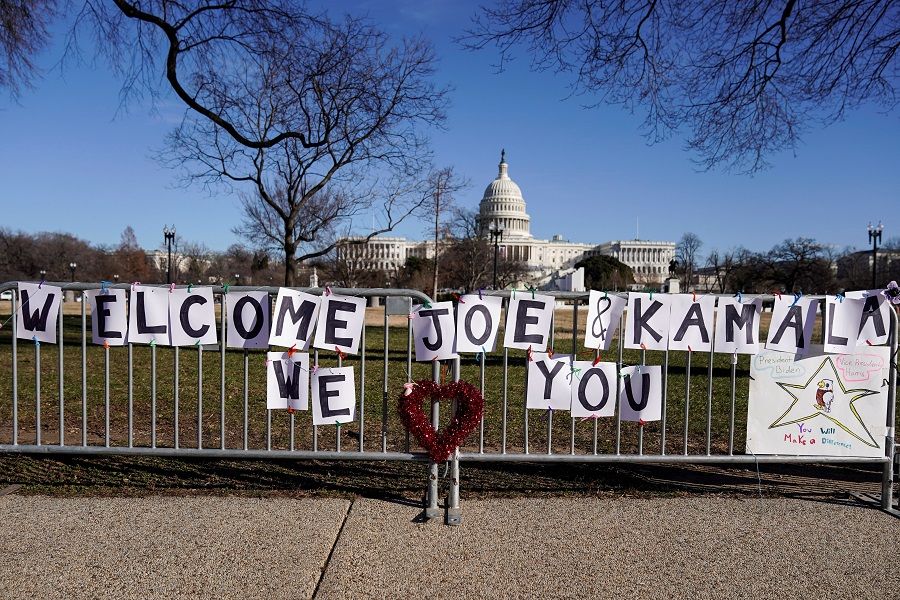 A sign welcoming US President-elect Joe Biden and Vice President-elect Kamala Harris is placed near the US Capitol days after supporters of US President Donald Trump stormed the US Capitol in Washington, US, 10 January 2021. (Joshua Roberts/Reuters)
