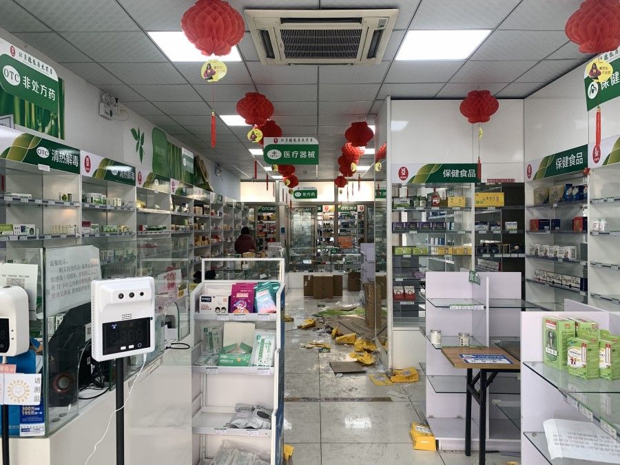 Empty shelves at a pharmacy in Beijing's Dongcheng district. Beijing residents are stocking up on medication for fever, cough and colds as China relaxes zero-Covid curbs. (SPH Media)