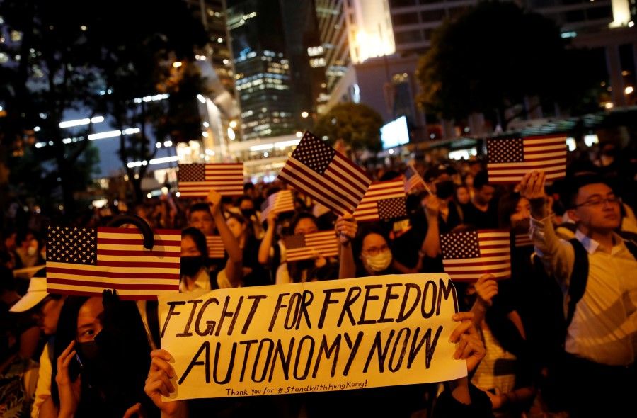 Anti-government demonstrators march in protest against the invocation of the emergency laws in Hong Kong, October 14, 2019. (Umit Bektas/REUTERS)