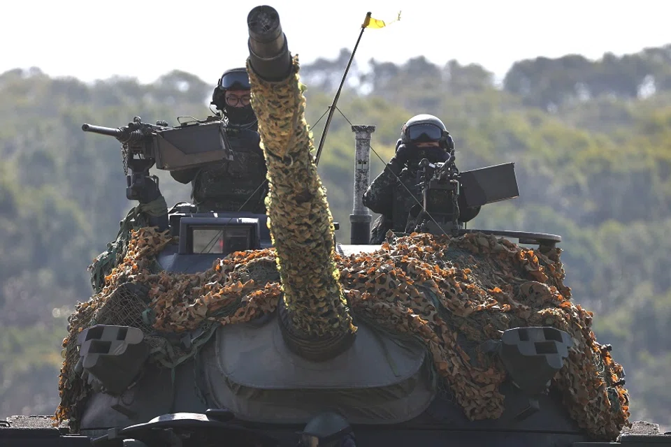 Soldiers take part in a drill in a military base ahead of the Lunar New Year in Hsinchu, Taiwan, 19 January 2021. (Ann Wang/Reuters)