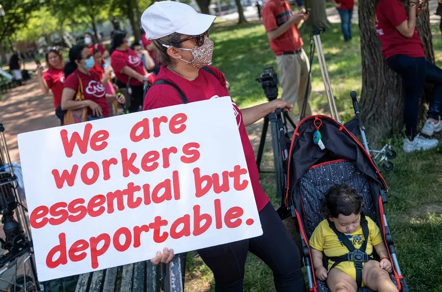 CASA, an advocacy organisation for Latino and immigrant people and other immigrant advocacy groups, rally outside the White House in Lafayette Park, to demand that the Biden administration take action on citizenship for all on 26 May 2021 in Washington, DC. (Mandel Ngan/AFP)