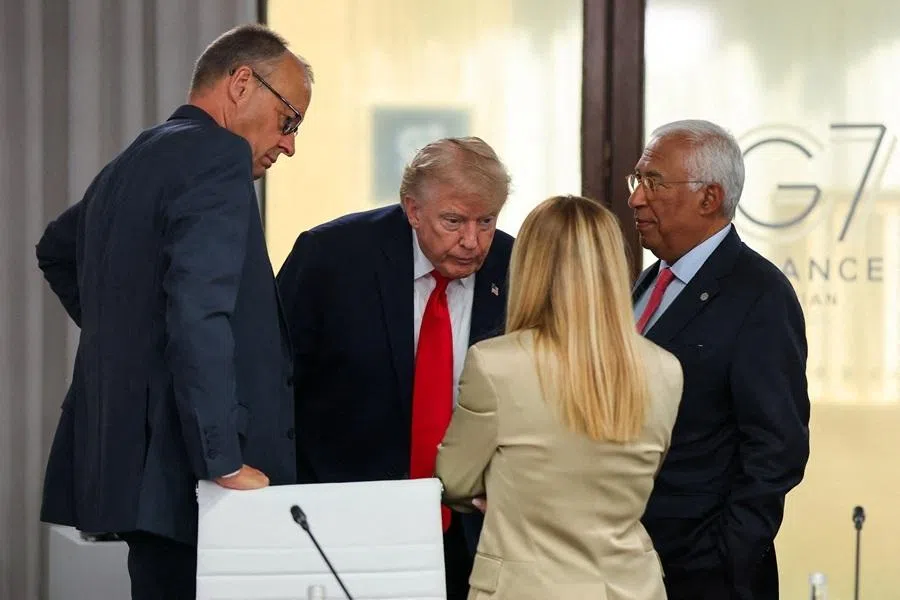 (From left) Germany’s Chancellor Friedrich Merz, US President Donald Trump, Italy's Prime Minister Giorgia Meloni and European Council President Antonio Costa attend a work lunch as part of the G7 summit, in Evian, eastern France, on 16 June 2026.