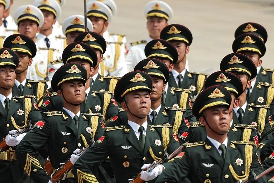 Chinese People's Liberation Army (PLA) honour guards march on the day of the welcome ceremony for US President Donald Trump by Chinese President Xi Jinping at the Great Hall of the People in Beijing, China, on 14 May 2026.