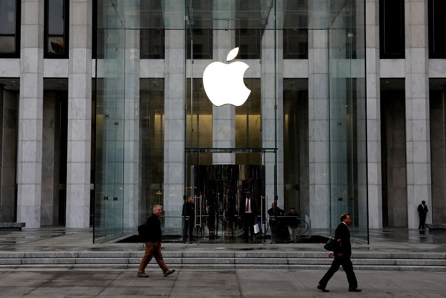 The Apple Inc. logo is seen hanging at the entrance to the Apple store on Fifth Avenue in Manhattan, New York, US, on 16 October 2019. (Mike Segar/File Photo/Reuters)