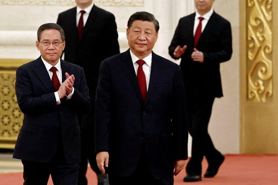 New Politburo Standing Committee members Xi Jinping and Li Qiang arrive to meet the media following the 20th Party Congress of the Chinese Communist Party, at the Great Hall of the People in Beijing, China, 23 October 2022. (Tingshu Wang/File Photo/Reuters)