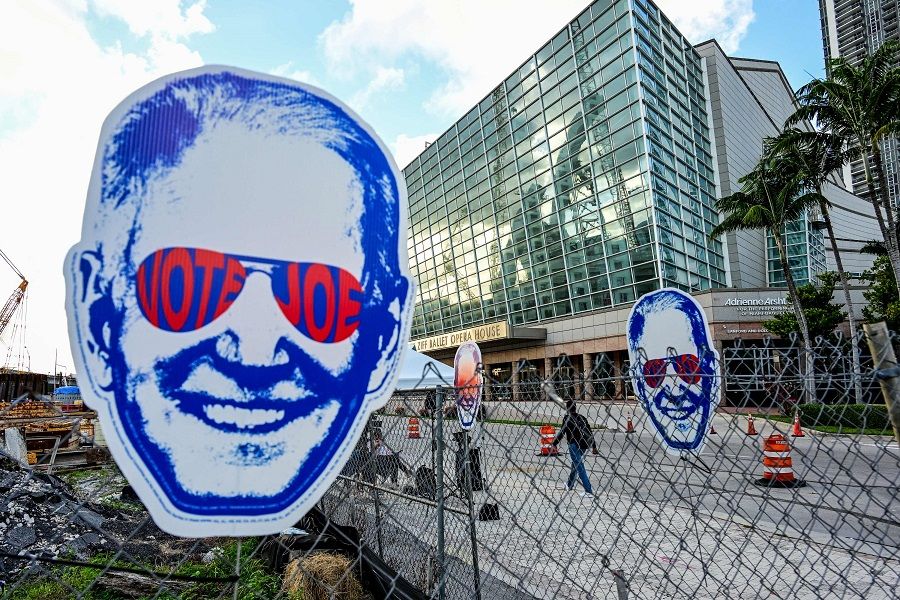 Signs supporting US President Joe Biden are displayed outside the Adrienne Arsht Center for the Performing Arts ahead of the third Republican presidential debate, in Miami, Florida, US, on 8 November 2023. (Giorgio Viera/AFP)