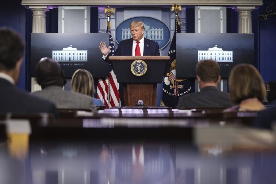 US President Donald Trump speaks during a news conference at the White House in Washington, 28 July 2020. (Oliver Contreras/Bloomberg)