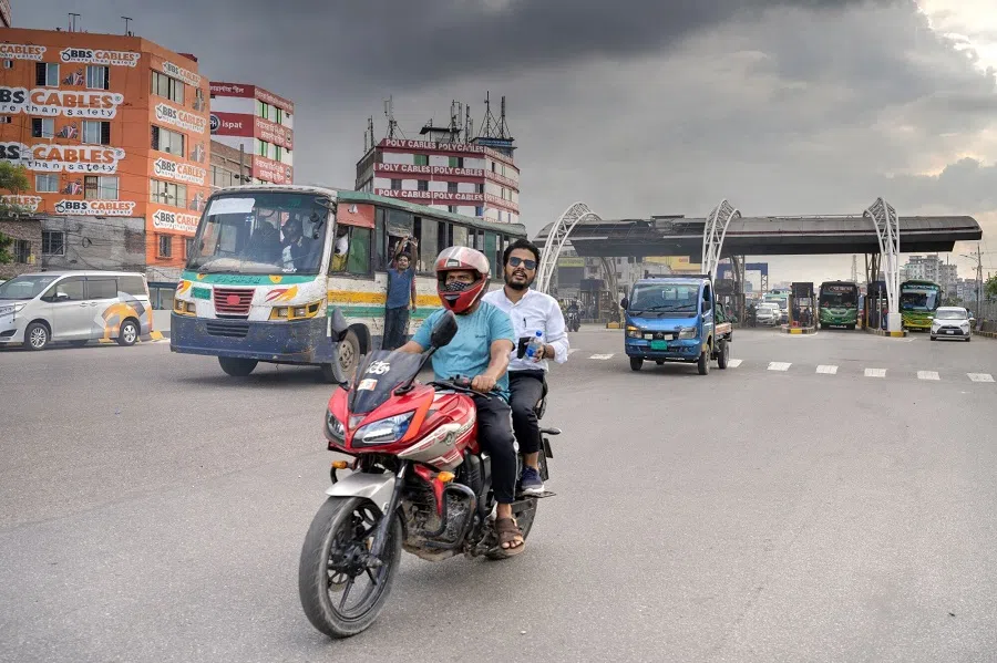 Motorists following protests in Dhaka, Bangladesh, on 24 July 2024. (Fabeha Monir/Bloomberg)