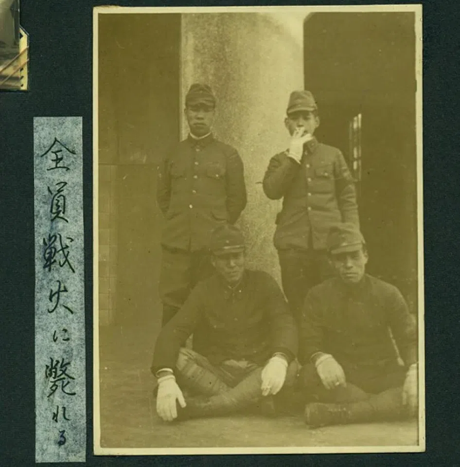 The album owner's close friends, who all died at war.