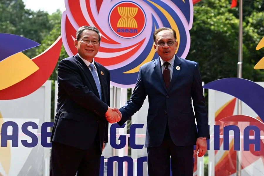 Malaysia’s Prime Minister Anwar Ibrahim shakes hands with China’s Premier Li Qiang ahead of the ASEAN-Gulf Cooperation Council (GCC)-China Summit, after the 46th Association of Southeast Asian Nations (ASEAN) Summit, in Kuala Lumpur, Malaysia, on 27 May 2025. (Mohd Rasfan/Pool via Reuters)