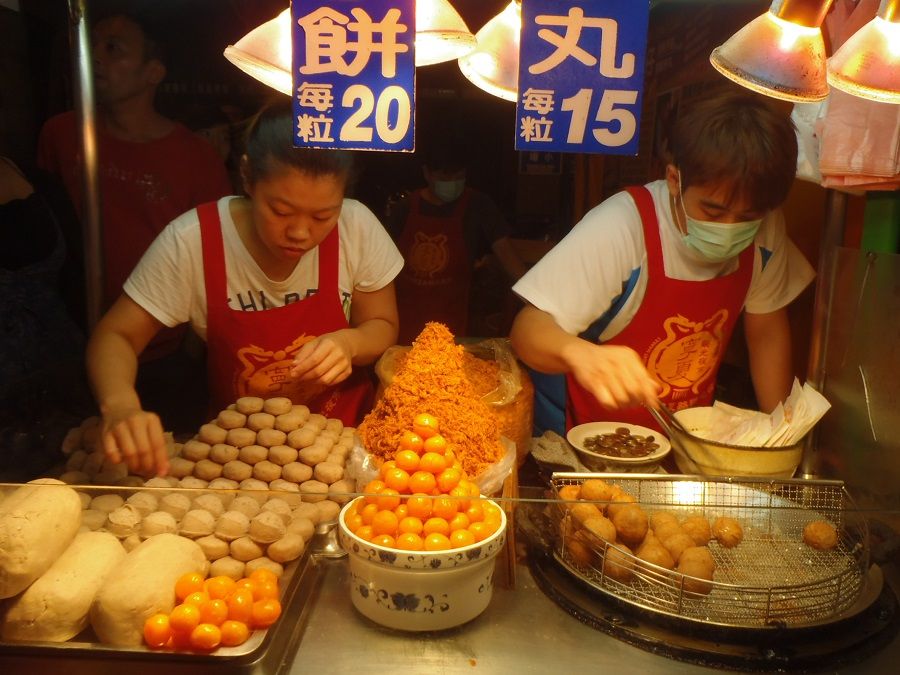 Workers prepare yam balls at a night market in Taipei, Taiwan. (SPH Media)