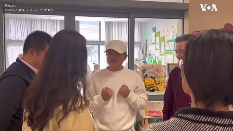 A screen grab from a video featuring Jack Ma (centre) visiting the Yungu School in Hangzhou. (Internet)