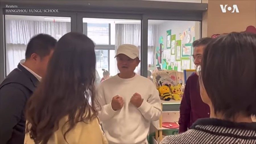 A screen grab from a video featuring Jack Ma (centre) visiting the Yungu School in Hangzhou. (Internet)