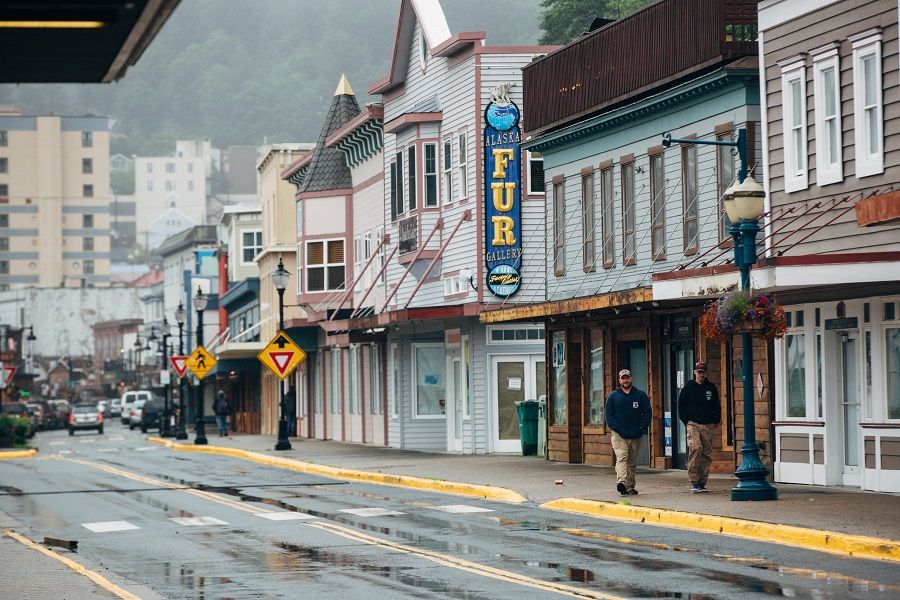 Pedestrians walk past closed seasonal stores on South Franklin Street in Juneau, Alaska, US, on 22 July 2020. (Meg Roussos/Bloomberg)
