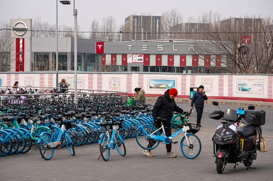 A Tesla dealership in Beijing, China, on 7 March 2025. (Na Bian/Bloomberg)