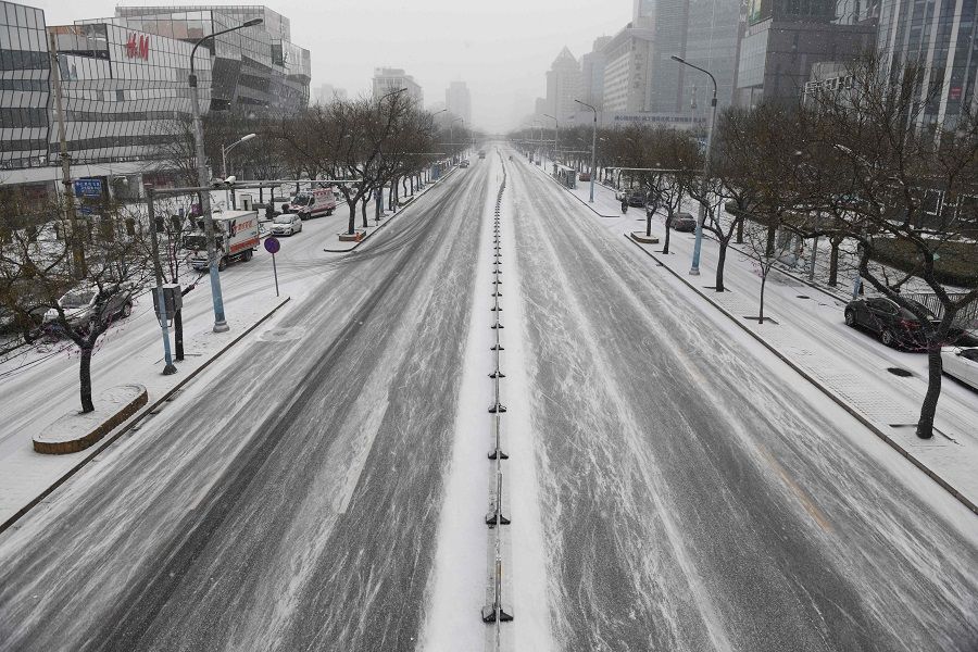 An empty Beijing street is seen on 5 February 2020, as China continues its fight against the coronavirus outbreak. (Greg Baker/AFP)