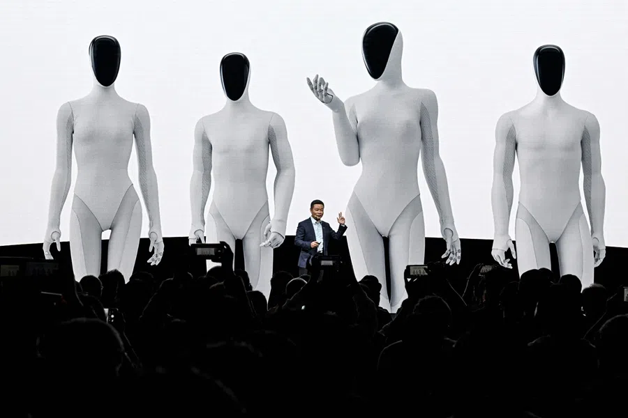 He Xiaopeng, co-founder and chair of Chinese electric vehicle maker Xpeng, launches Xpeng's next-gen IRON humanoid robot during AI Day press conference at its headquarter in Guangzhou, China, on 5 November 2025.