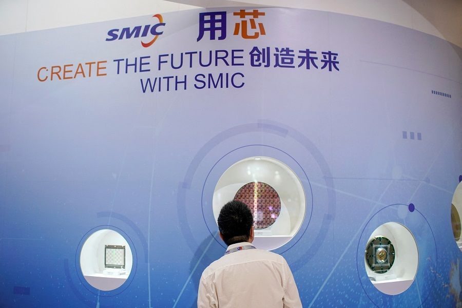 A man visits a booth of Semiconductor Manufacturing International Corporation (SMIC) at China International Semiconductor Expo (IC China 2020) in Shanghai, China, 14 October 2020. (Aly Song/File Photo/Reuters)